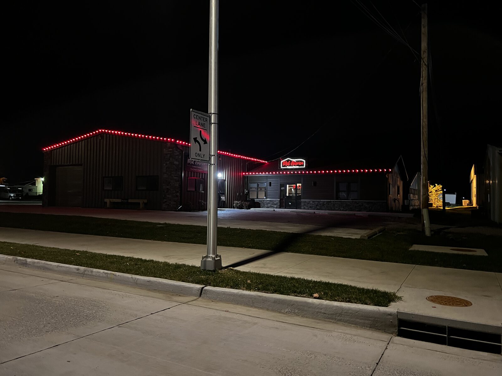 All-red C9 LED Christmas lights on commercial building